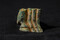 Retrouvé dans la tombe princière de  la Dame de Vix  datant de 500-490 av. notre ère, au cours de la fouille de 2019 à Vix (Côte-d'Or), ce petit fragment de bronze décoré de bas de pattes de chevaux était jusqu'à présent le seul élément manquant sur la frise de quadriges et de hoplites décorant la cratère grec mis au jour en 1953. 