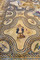 Mosaïque représentant l'histoire de Penthée datée du IIe s. de notre ère. Fouille de l'avenue Jean Jaurès à Nîmes (Gard) en 2006-2007.   Ici un médaillon quadrilobé orné d'une figure de Bacchante, en pied, portant le thyrse, attribut de Dionysos.