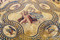 Scène du châtiment de Penthée et d'Agavé dans un médaillon quadrilobé au centre de la mosaïque de Penthée (IIe s. de notre ère). Fouille de l’avenue Jean-Jaurès, Nîmes (Gard), 2006-2007. 