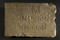 Plaque funéraire (21 cm de long, 14 cm de haut) provenant d'un colombarium, découverte dans une fosse creusée dans une pièce d'une domus, Ier s. de notre ère, Angers (Maine-et-loire), 2010. 
