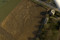 Vue aérienne après décapage de la terre végétale du site fouillé au lieu-dit  l'Abbaye, à Trémeur (Côtes d'Armor), 2011.  On distingue nettement des fossés ayant servi à délimiter, pendant plusieurs siècles, différents habitats. Un établissement rural antique a ici succédé à une ferme gauloise. 