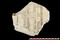 Un des 36 blocs de pierres lithographiques retrouvé rue Marceau à Dijon (Côte-d'Or) en 2011.  Ces pierres présentent des traces, en négatif, de textes et d'éléments graphiques divers. Elles appartenaient à la maison Jobard, une des imprimeries les plus importantes de Dijon à la fin du XIXe s.