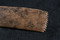 Peigne en os (6cm de longueur environ) servant à la réalisation de motifs décoratifs sur céramique, IIe-Ier s. avant notre ère, ferme gauloise de Wissous (Essonne), 2011.