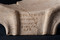 Dédicace au dieu Apollon gravée sur un mortier en céramique découvert dans un des deux puits associé au temple, fin IIe-IIIe s. de notre ère, Mesnil-Saint-Nicaise (Somme), 2012.Gravée sur le déversoir du récipient au moyen d'un stylet appliqué sur l'argile après cuisson, l'inscription peut être transcrite : Deo Apollin(i) / Vatumaro / Iunianus / Iuni fil(ius) / d(e) s(uo) d(edit) soit  Au dieu Apollon Vatumarus, Iunianus, fils de Iunius, a fait don (de cet objet) à ses frais .    