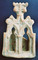 Carreau-niche de couronnement produit par l'atelier de potier d'Aoste (Isère), XVe s., 2006.  Ces pièces sont destinés à orner le sommet d'un poêle en terre cuite. 