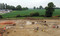Vue générale du site de la Lande des Nouailles en cours de fouille, XIVe-XVIIe s., Domagné (Ille-et-Vilaine), 2013.Au centre de la photo apparaissent les fondations du plus grand bâtiment de la ferme.