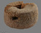 Partie supérieure mobile d'une meule rotative (diamètre 35 cm ; hauteur 17 cm), ou catillus, granite, Ier s. avant notre ère, Brielles (Ille-et-Vilaine), 2012. 