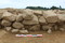 Vue de détail du parement d'un muret daté de La Tène finale, Kervouyec, Quimper (Finistère), 2011.  Ces vestiges sont inhabituels pour l'époque, les traces d'habitat gaulois se limitant en général à l'empreinte de trous de poteau marquant l'ossature des bâtiments. 