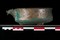 Bassin en alliage cuivreux, muni d'un filtre et d'un bec verseur orné d'une tête zoomorphe, représentant probablement un porc. Il repose sur trois pieds réalisés par des cabochons en tôle scellés au plomb. Pièce d'un service à vin du IIIe siècle de notre ère, découvert sur le site d'Argentomagus à Saint-Marcel (Indre), 2013.